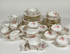 A Royal Crown Derby "Pixton Roses", dinner service comprising eight soup bowl saucers, eight soup