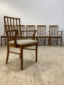 A set of Six (4+2) mid century teak and beech dining chairs, with upholstered seats, H92cm
