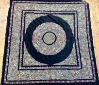 An Edwardian embroidered black felted panel, the centre square with circular medallion, with