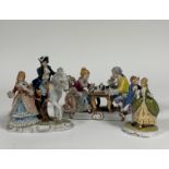 A porcelain figure group of a Couple from the 18th century playing Chess (marked verso) ( l - 24cm