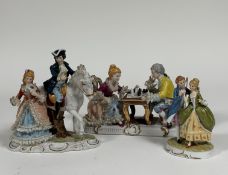 A porcelain figure group of a Couple from the 18th century playing Chess (marked verso) ( l - 24cm