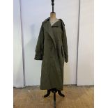 A Vintage Burberry green trench coat