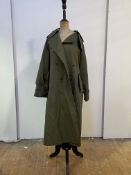 A Vintage Burberry green trench coat
