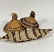 Two African straw woven hats with pierced looping borders, one with damage to top, (h 25cm x 32cm, h