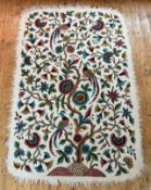 A Kashmiri felted natural wool rug with fringed border with hand embroidered tree with three