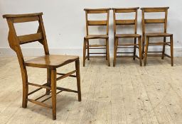 A set of four late 19th/ Early 20th century elm and beech chapel chairs, the rail back over shaped