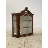 A glazed walnut wall hanging display cabinet, with two shelves to interior, H73cm