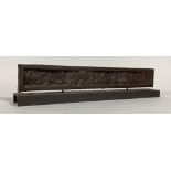 An industrial abstract bronzed cast metal sculpture, on a cast iron channel section base,