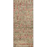 A 19thc sewn work sampler with alphabet worked on linen, worked by Janet Calendar aged 7 years, in