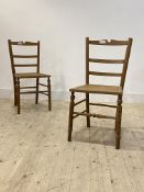 A pair of Edwardian beech and cane side chairs (A/F) H83cm