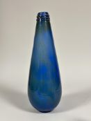 A tall tapered blue glass vase decorated with speckled gold pyrites, inscribed verso