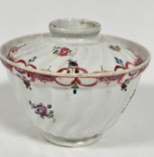 A late 18thc Newhall style English porcelain spiral lobbed posset bowl and cover, decorated with han