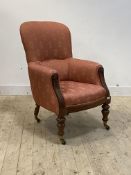 A mid 19th century mahogany framed spoon back chair, upholstered in striped red satinised cotton,