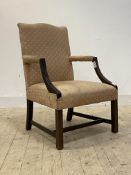 An Edwardian mahogany Gainsborough type armchair, upholstered seat and back over swept open arms.