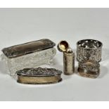 A Victorian silver cylinder scent case with engraved floral sprays, complete with original glass