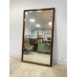 A large mahogany framed wall hanging mirror, early 20th century, with bevelled glass (converted)