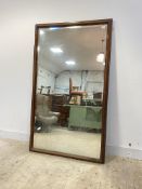 A large mahogany framed wall hanging mirror, early 20th century, with bevelled glass (converted)