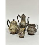 An Epns four piece tea and coffee service of baluster form, the stylised floral and C scroll