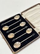 A set of six Birmingham silver bean handled coffee spoons complete with original fitted box, Birming