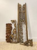 A pair of early 20th century Chinese floral pierce carved giltwood wall panels, some losses (L151cm)