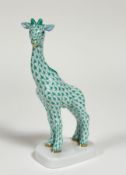 A Herend porcelain model of a Giraffe in green pattern with gilt nostrils, mouth and hooves. (h