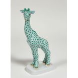 A Herend porcelain model of a Giraffe in green pattern with gilt nostrils, mouth and hooves. (h