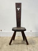 A carved walnut spinning chair, the octagonal seat on four ring turned supports, H91cm
