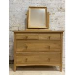 A contemporary solid hardwood chest, fitted with two short and three long drawers, raised on stile