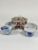 Three Japanese decorated shallow dishes with one cover, (h 4.5cm excluding cover x 14.5cm) and a