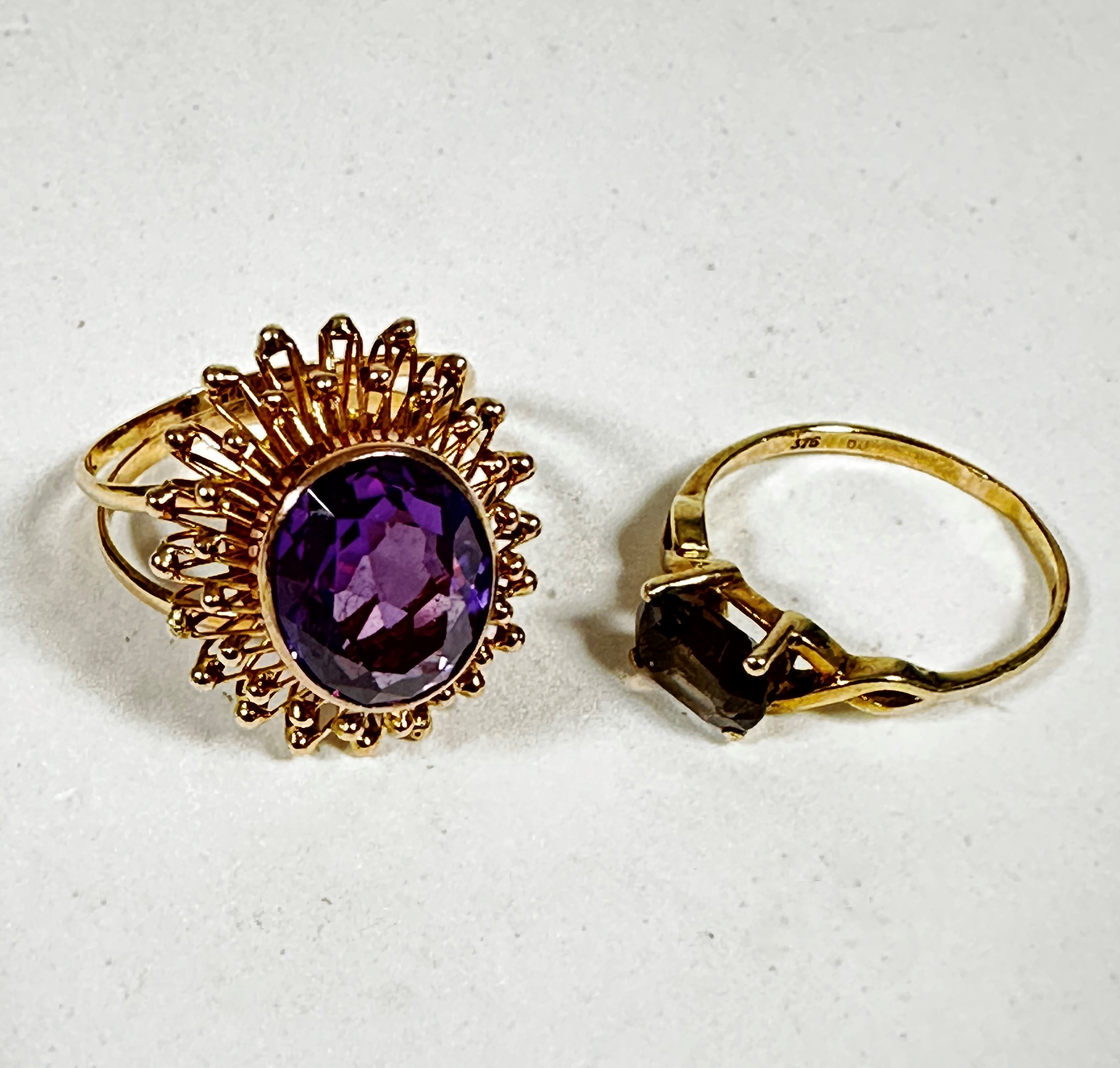 A yellow metal oval amethyst style dress ring with open work beaded surround, approx 3ct, (Q) and