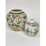 A Chinese famille rose style decorated ginger jar with tobacco leaf decorated border to top and