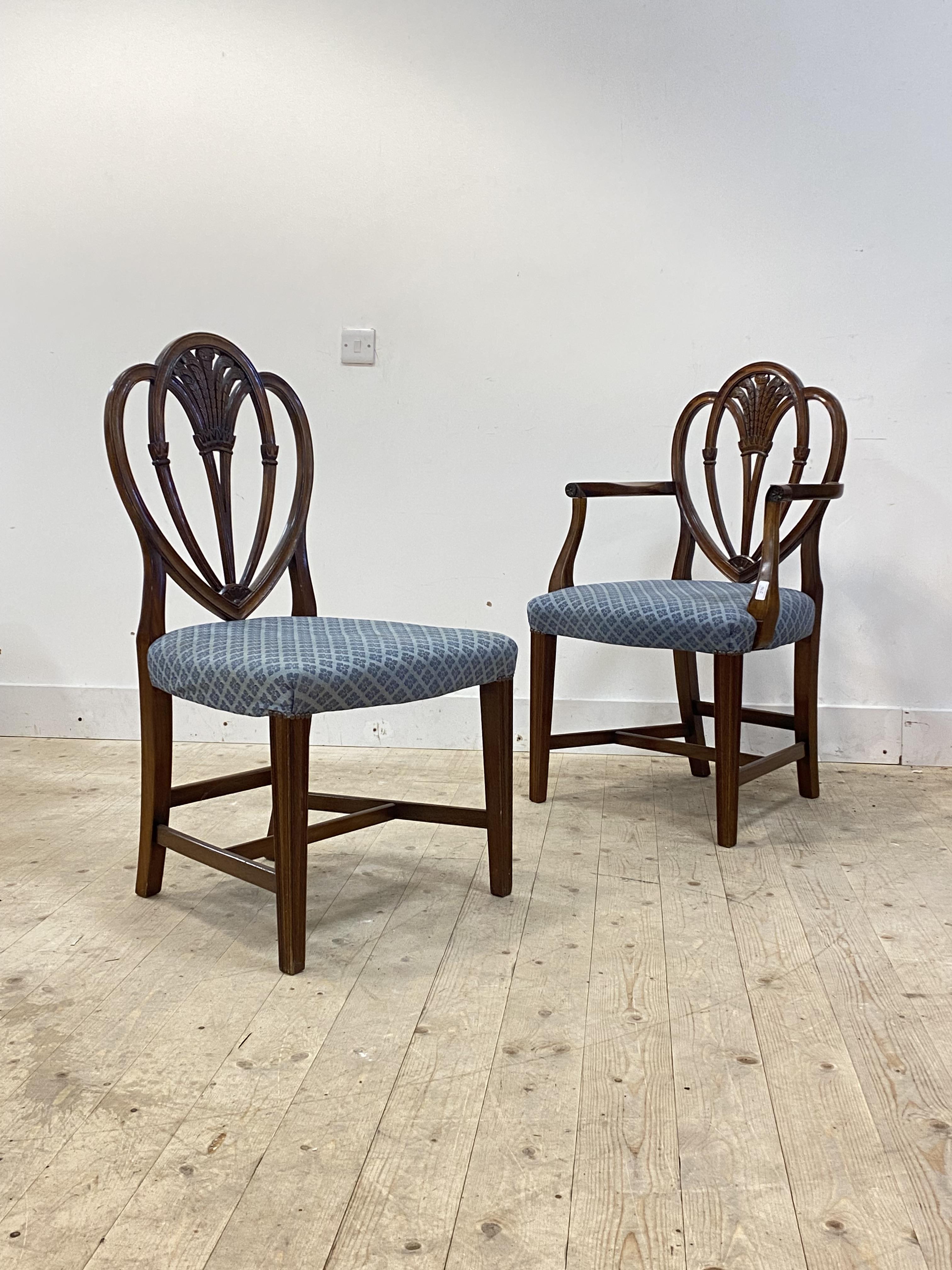 A set of two (1+1) mahogany Hepplewhite style dining chairs, H99cm