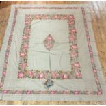 A stunning late 19th early 20thc bed cover of grey panelled cotton, the centre diamond with pink