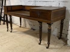 A late Georgian mahogany satinwood and rosewood dressing table, with recessed top, frieze drawer,