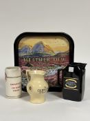 A collection of whisky memorabilia comprising of a "Mackinlay's Old Scot Whisky" ceramic jug (h-