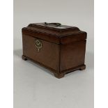 A George III mahogany tea caddy, original brass swing handle and escutcheon, caddy top opening to