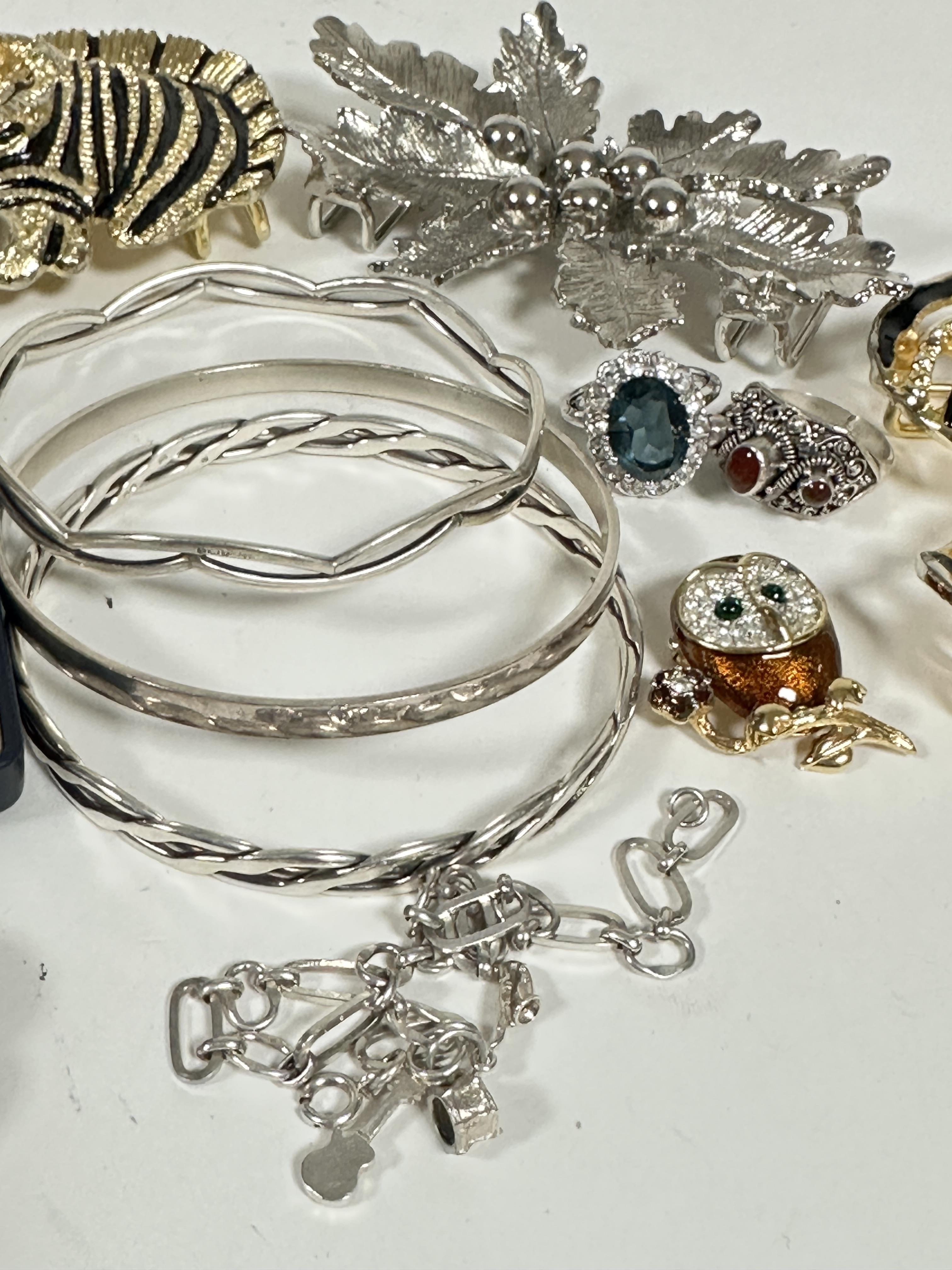 A collection of costume jewellery including a silver lattice band bracelet, (d 7cm)a plain silver - Image 2 of 3