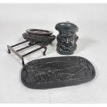 A brass rectangular kettle stand (5cm x 12cm x 14cm) and a Burns at the Plough cast iron panel,