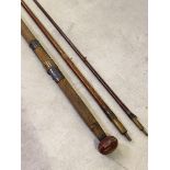 Fishing interest, A Hardys Greenhart 16'2" three section fly fishing rod, with cork handle and brass
