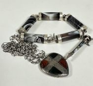 A Scottish agate barrel style bracelet with white metal mounts, (L 22cm) a Scottish style white