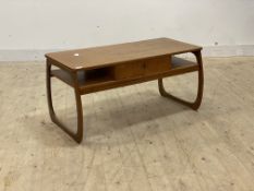 Parker Knoll, a mid century teak coffee table, fitted with drawer and under tier raised on shaped