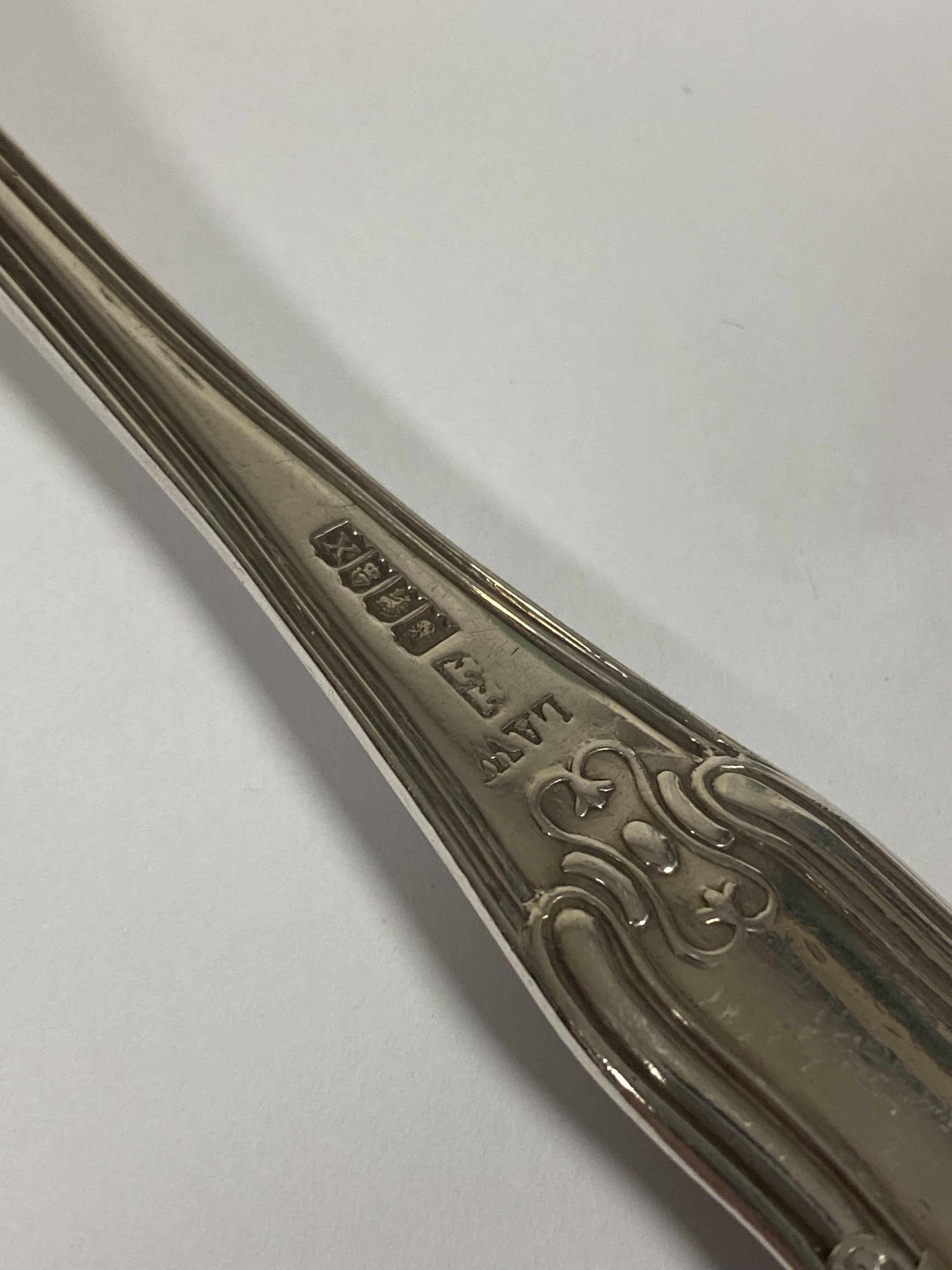 An Irish Dublin 1818 silver Fiddle, Shell and Thread pattern table spoon with engraved griffin - Image 2 of 7