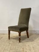 A Victorian bedroom chair, upholstered in green velvet, raised on turned supports, H90cm