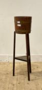 A coopered oak jardiniere stand, R A Lister & Co, H92cm