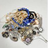 A large collection of costume jewellery including an Austrian style crystal bead necklace, a blue