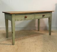 A 19th century painted pine work table, the later satin walnut top over two frieze drawers, raised