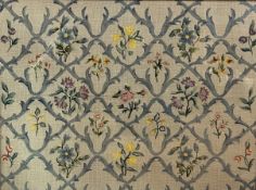 Sewn work panel of lattice design with stylised carnations, tulips, cornflower's, etc gilt glazed