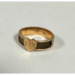 A 19thc yellow metal mourning ring set central heart engraved with initials MBM, with platted hair