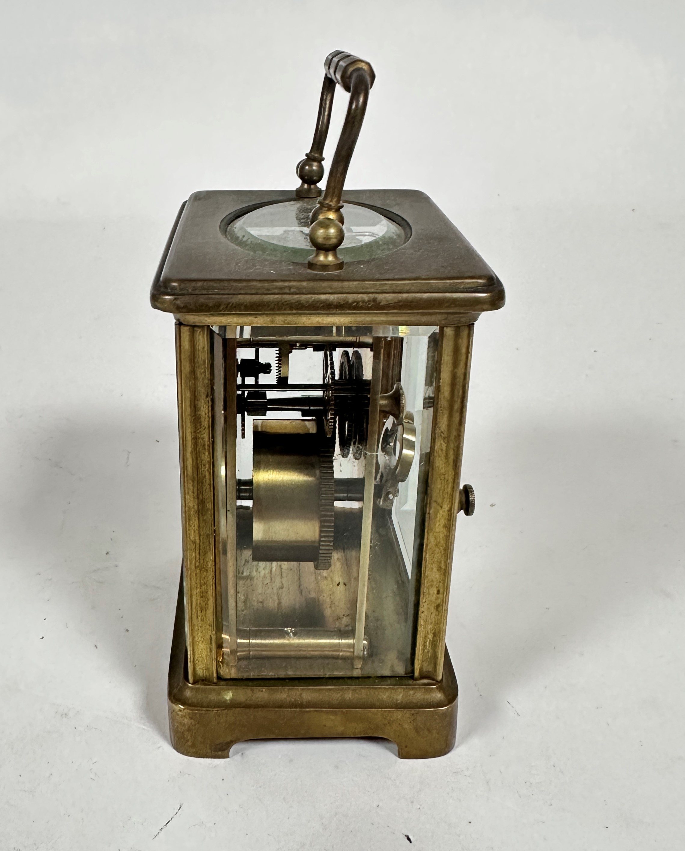 A French brass four glass carriage clock with enamelled dial, retailed by Rowell of Oxford, with - Image 2 of 3