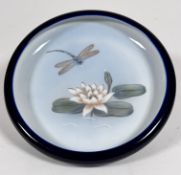 A Royal Copenhagen circular dish decorated with waterlily and dragonfly, (4cm x 24cm) no signs of